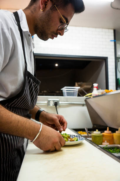 istock Mexican chef working in an authentic Mexican restaurant 1017830988