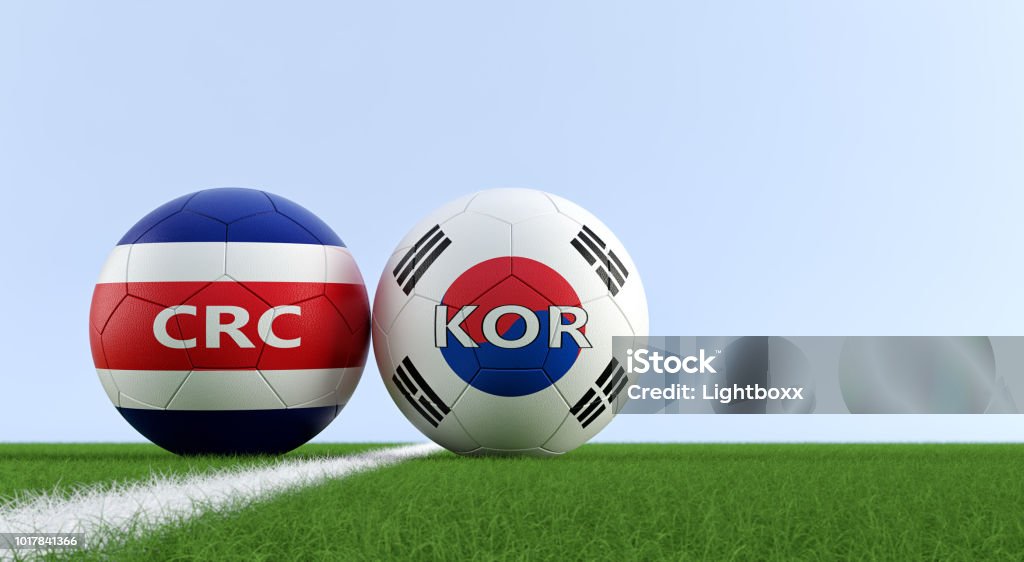 Costa Rica vs. South Korea Soccer Match - Soccer balls in Costa Rica and South Korea national colors on a soccer field. Copy space on the right side - 3D Rendering Costa Rica Stock Photo