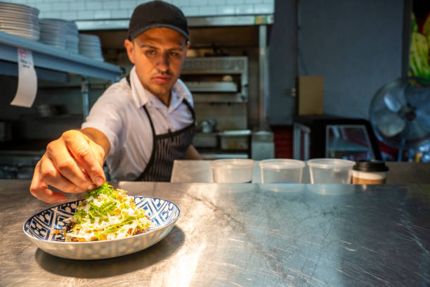 istock Mexican chef working in an authentic Mexican restaurant 1017841378
