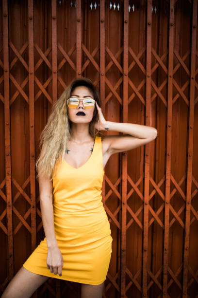 istock Woman with yellow dress 1017845560