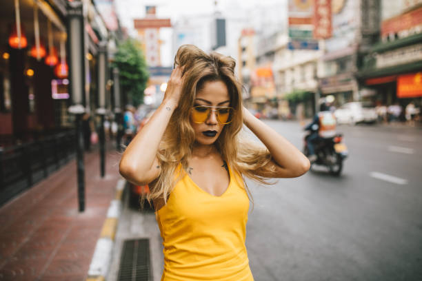 istock Woman adjusting her hair 1017845598