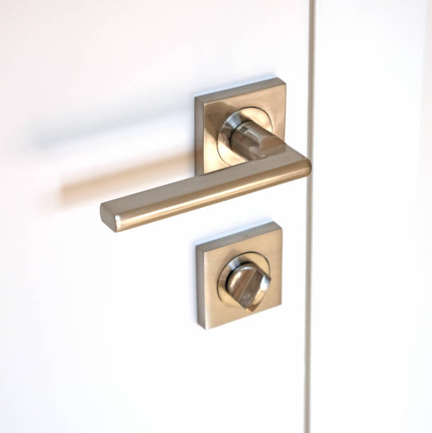 istock Door integrated lock, consisting of a rotating metal handle and a locking device 1017847782