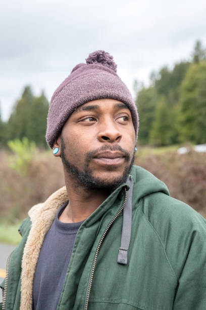 African descent man looking away