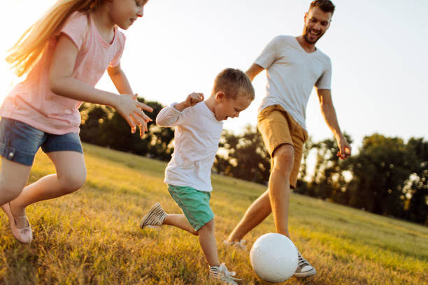 istock Father and children having fun 1017855142
