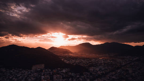 istock 08/11/2018 Nha Trang, Vietnam : Sunset on city with mountain view 1017865850