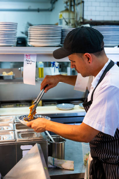 istock Mexican chef working in an authentic Mexican restaurant 1017869224