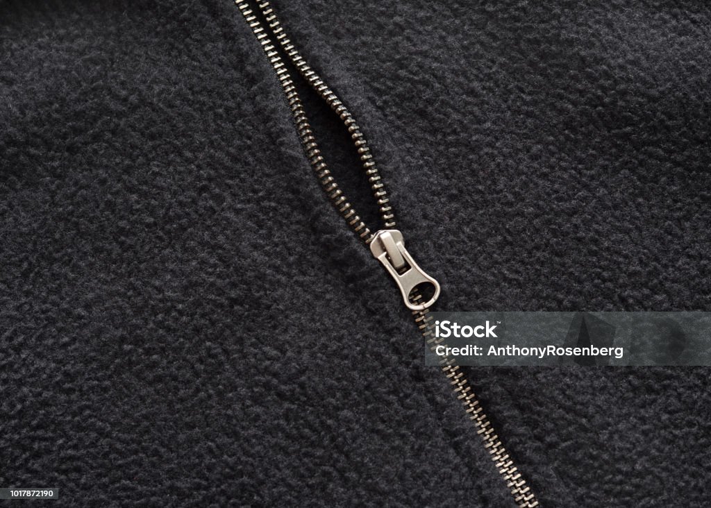 Zipper on a Fleece Coat Closeup of a zipper on a black fleece coat. Fleece Coat Stock Photo
