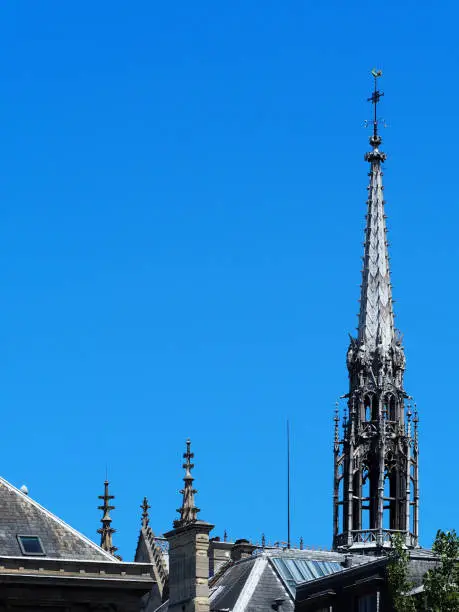 Roofs of Paris. The Sainte Chapelle (Holy Chapel) is a royal chapel in the Gothic style, within the medieval Palais de la Cite, on the Ile de la Cite in the River Seine in Paris, France
