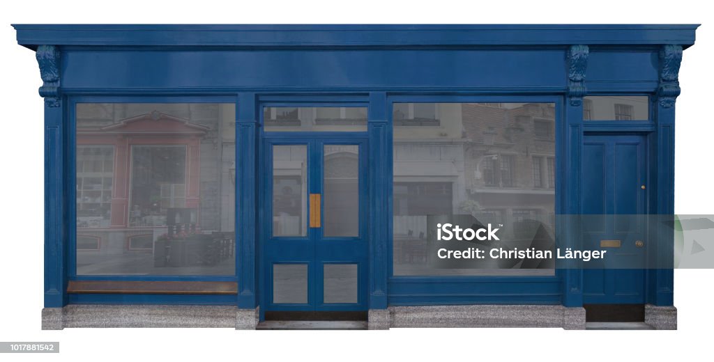 Blue lacquered wooden facade from a sales room, isolated on white background Blue painted wooden facade of a sales room with shop and extra house entrance isolated on white background Store Window Stock Photo
