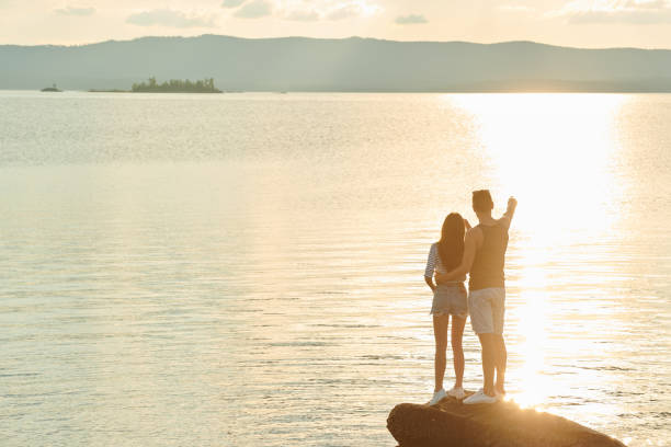 istock Couple enjoying beautiful nature 1017884650
