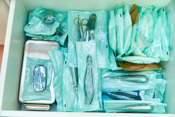 Sterile sealed dental instruments Sealed dental instruments lie in the drawer close-up. medical supplies stock pictures, royalty-free photos & images