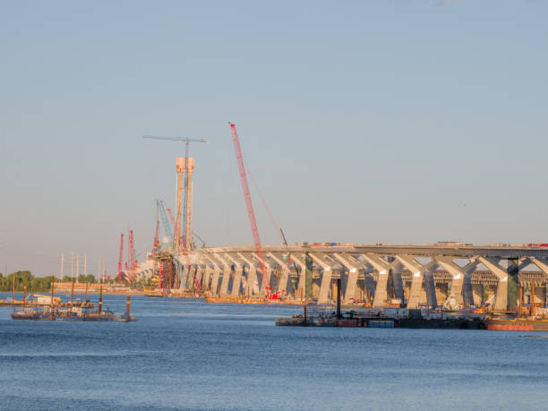 istock Major bridge construction site at the golden hour, Montreal, quebec, Canada. 1017900864