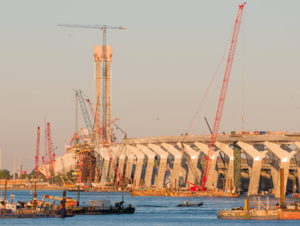 istock Major bridge construction site at the golden hour, Montreal, quebec, Canada. 1017900892
