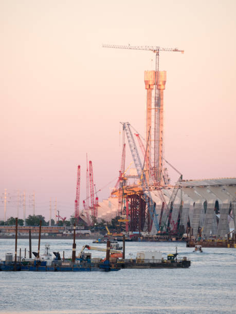 istock Major bridge construction site at the golden hour, Montreal, quebec, Canada. 1017900918