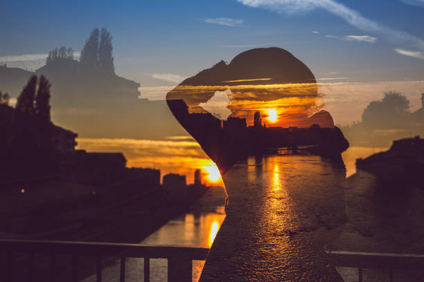 istock Hipster woman posing on a bridge at sunset 1017906426