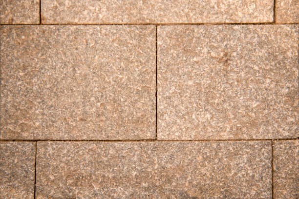 istock Background from the grey outer wall of large stone masonry 1017920154