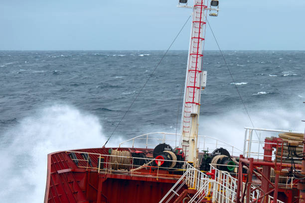 istock waves crashing against the bow 1017932238