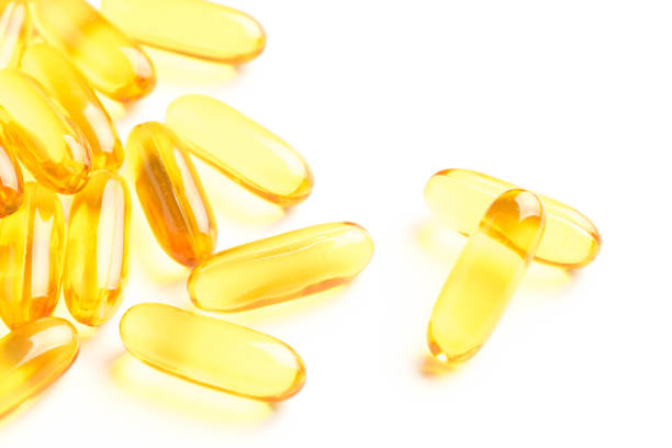 istock fish oil capsules isolated on white background 1017936862