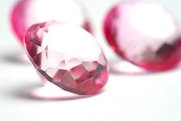 istock pink diamond isolated on white background 1017936924