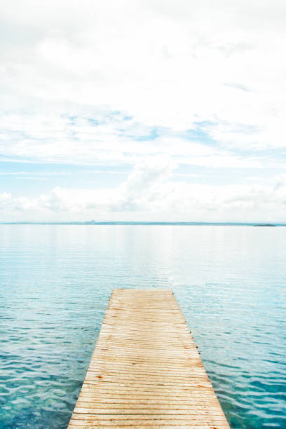 istock White Cloudy sky and sea summer background 1017953468