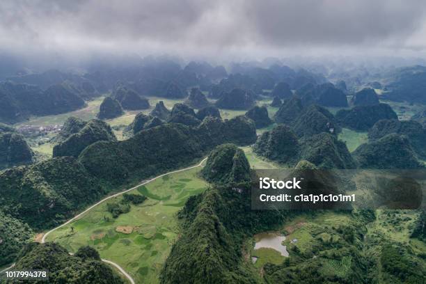 Aerial View Of Karst Mountains And Rice Fields Stock Photo - Download Image Now - Aerial View, Agricultural Field, Asia