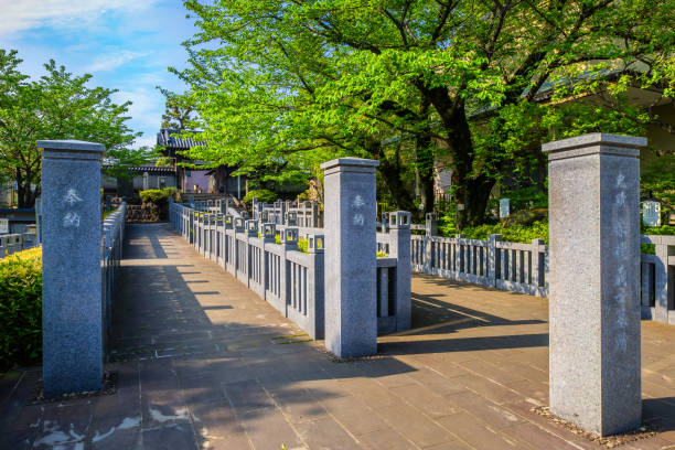 The way to the grave of 47 ronin at Sengakuji Temple in Tokyo, Japan TOKYO, JAPAN - APRIL 20 2018: The way to the grave of 47 ronin, the 47 loyal masterless samurai, one of the most popular Japanese historical epic legends at Sengakuji Temple harakiri photos stock pictures, royalty-free photos & images