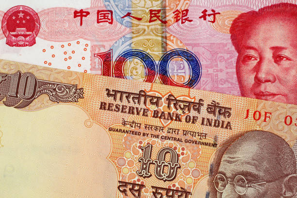 istock Chinese 100 Yuan Bank Note With 10 Indian Rupee 1018011208