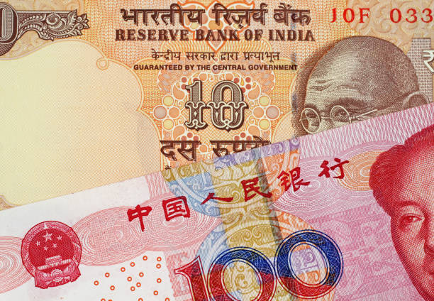 istock Chinese 100 Yuan Bank Note With 10 Indian Rupee 1018011222