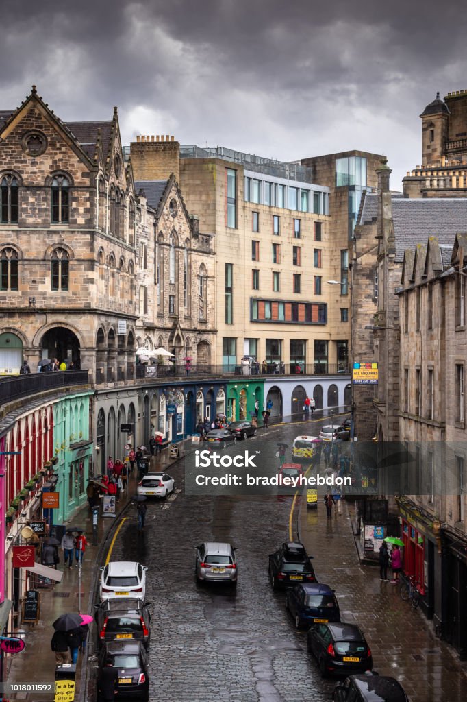 Victoria Street in Edinburgh, Scotland Victoria Street in the Old Town has to be one of the most photographed locations in Edinburgh. Its gentle curve and colorful shopfronts make it a favorite spot for tourist photos, postcards and TV commercials. High Up Stock Photo