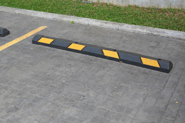 istock Bumps barrier for reduce car speed when parking. 1018025184