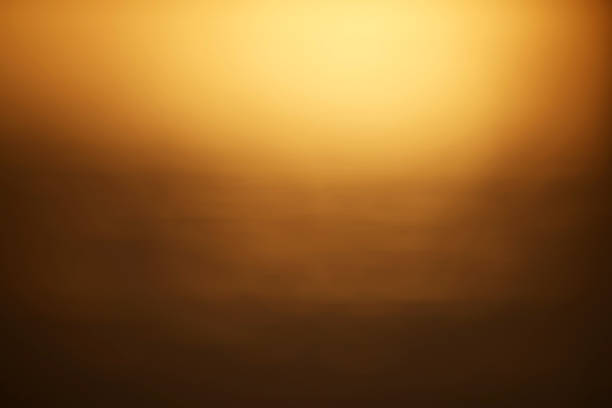 istock defocused background in gold color 1018047238