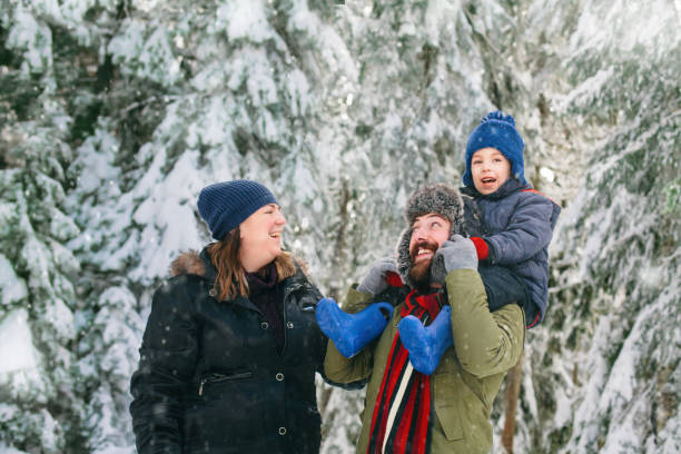 istock Family in a winter walk 1018048016