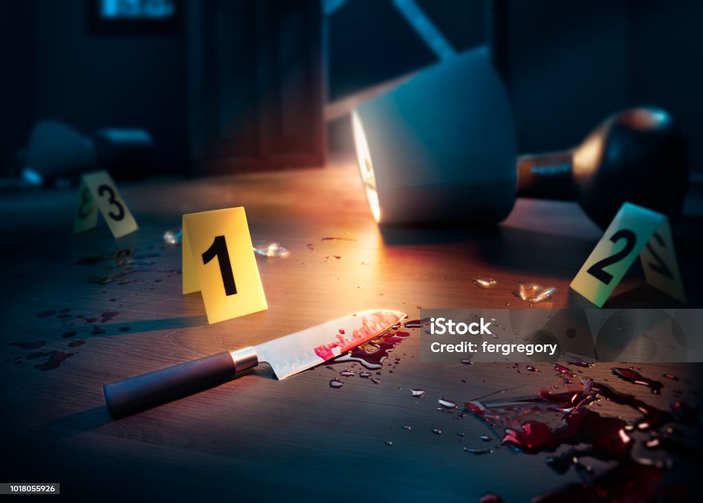 Bloody Crime Scene With Knife And Evidence Markers Stock Photo
