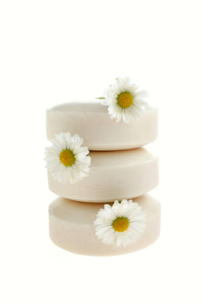 istock Chamomile soap. White soap with chamomile extract on white background. Organic Cosmetics 1018056228