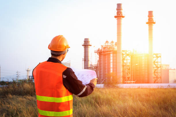 istock Engineer working with tablet PC near power plant 1018062088