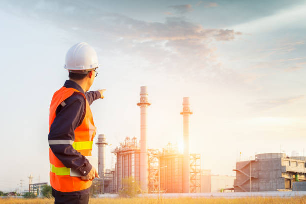 istock Engineer working with tablet PC near power plant 1018062146