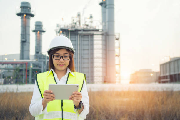 istock Engineer working with tablet PC near power plant 1018062166