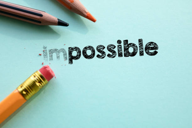 Making impossible in to possible by eraser Making impossible in to possible by eraser. Cencept for action and reaching goals. impossible possible stock pictures, royalty-free photos & images