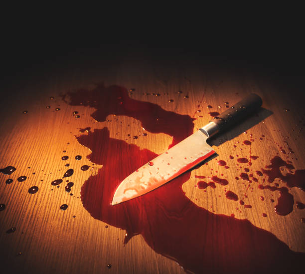 istock Bloody crime scene with knife on the floor 1018067328