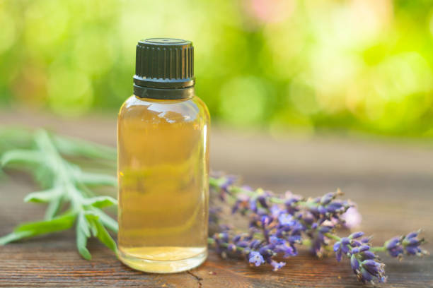 istock lavender essential oil in  beautiful bottle on table 1018069728