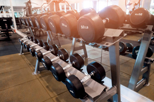 istock row of dumbbells in gym 1018075558