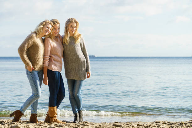 istock Three fashionable models outdoor 1018076532