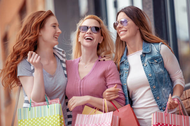 istock Happy friends in shopping 1018082050
