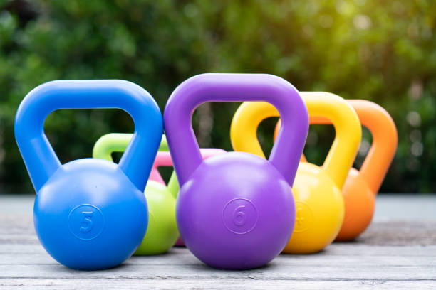 istock Kettlebells on the table, healthy and sport concept 1018085692