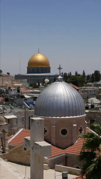 Two domes between the rooftops in religious Jerusalem, Israel