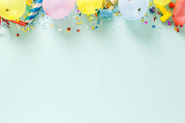 istock Flat lay decoration party pastel blue background border top view 1018091696