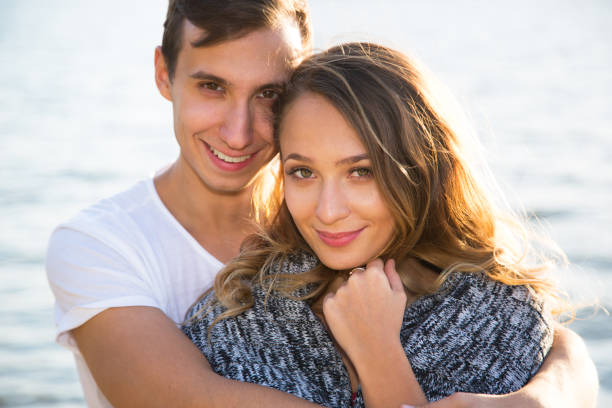 istock Young couple on the beach 1018095728