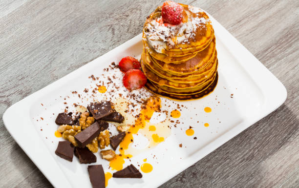 istock Pumpkin pancakes with sauce 1018099098
