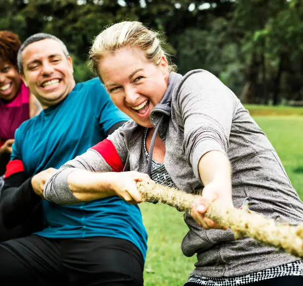 Team competing in tug of war