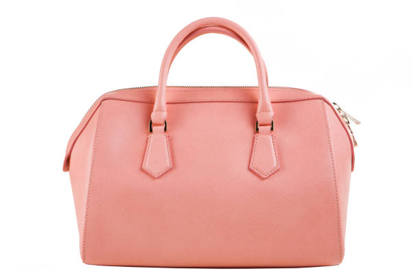 istock pink female bag on a white background, fashionable bag, isolate 1018110578